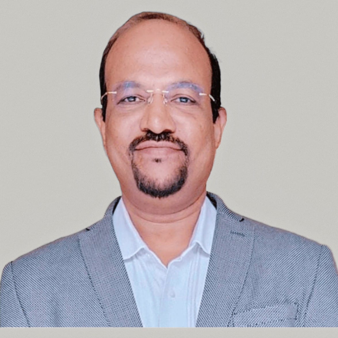 Dr. Mohan Belgamwar